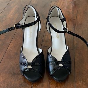 Black ankle strap peep toe pumps
